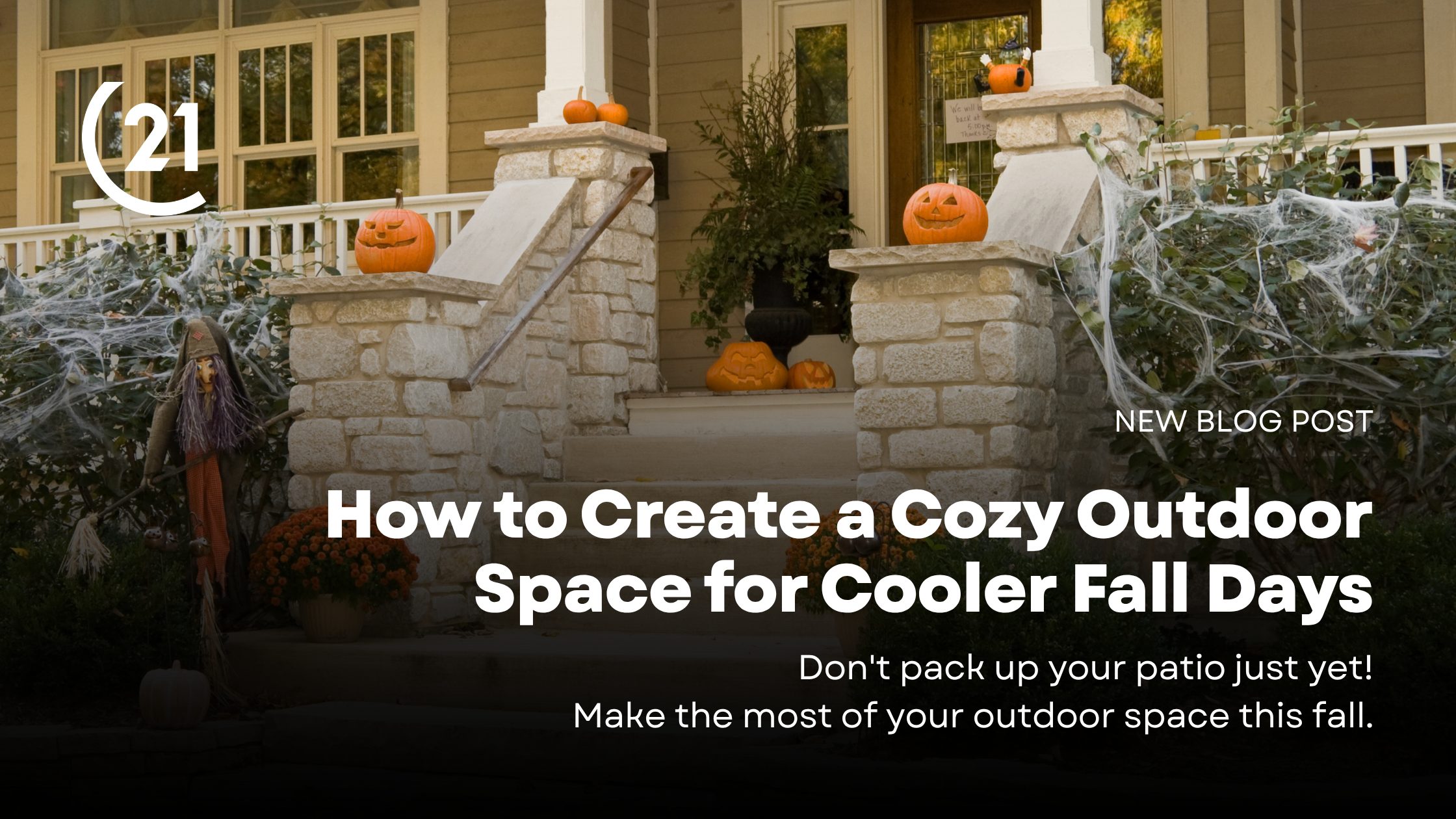 Cozy outdoor patio decorated for fall with comfortable seating and warm lighting